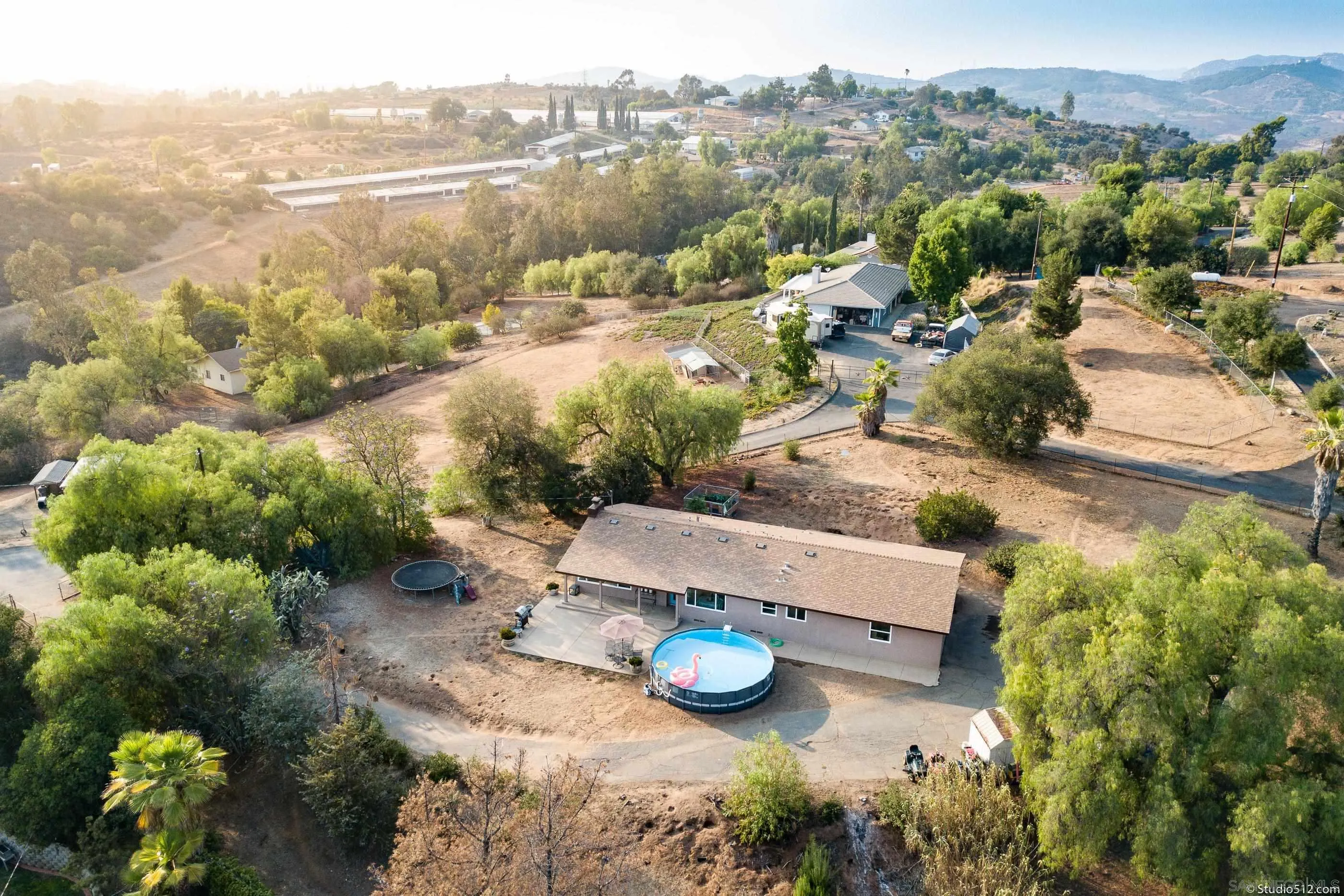 31151 Lilac Road Valley Center, CA 92082 - Photo 1 of 25 an aerial view of a house with yard