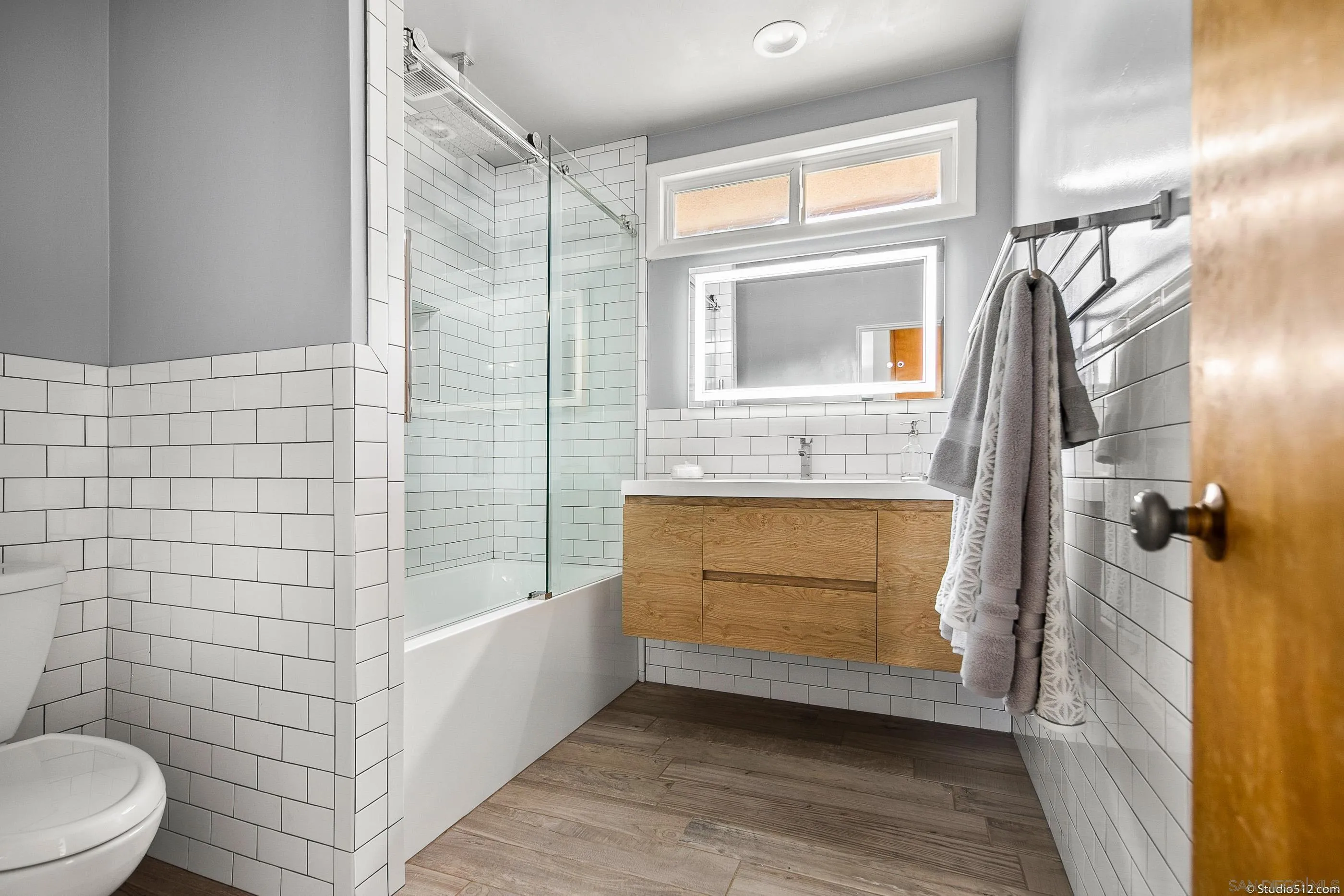 31151 Lilac Road Valley Center, CA 92082 - Photo 12 of 25 a bathroom with a sink a toilet and shower