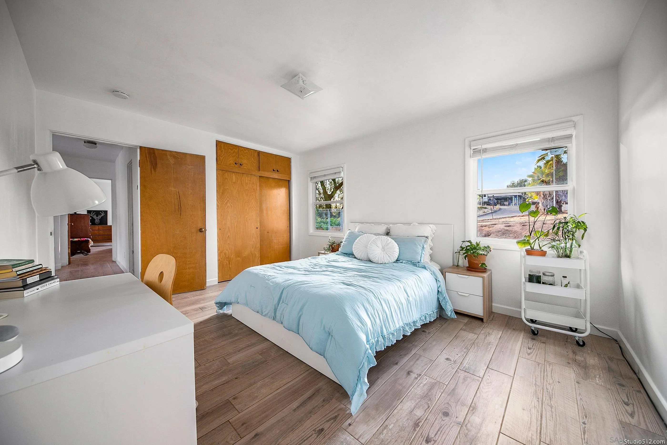 31151 Lilac Road Valley Center, CA 92082 - Photo 14 of 25 a bedroom with a bed and a dresser