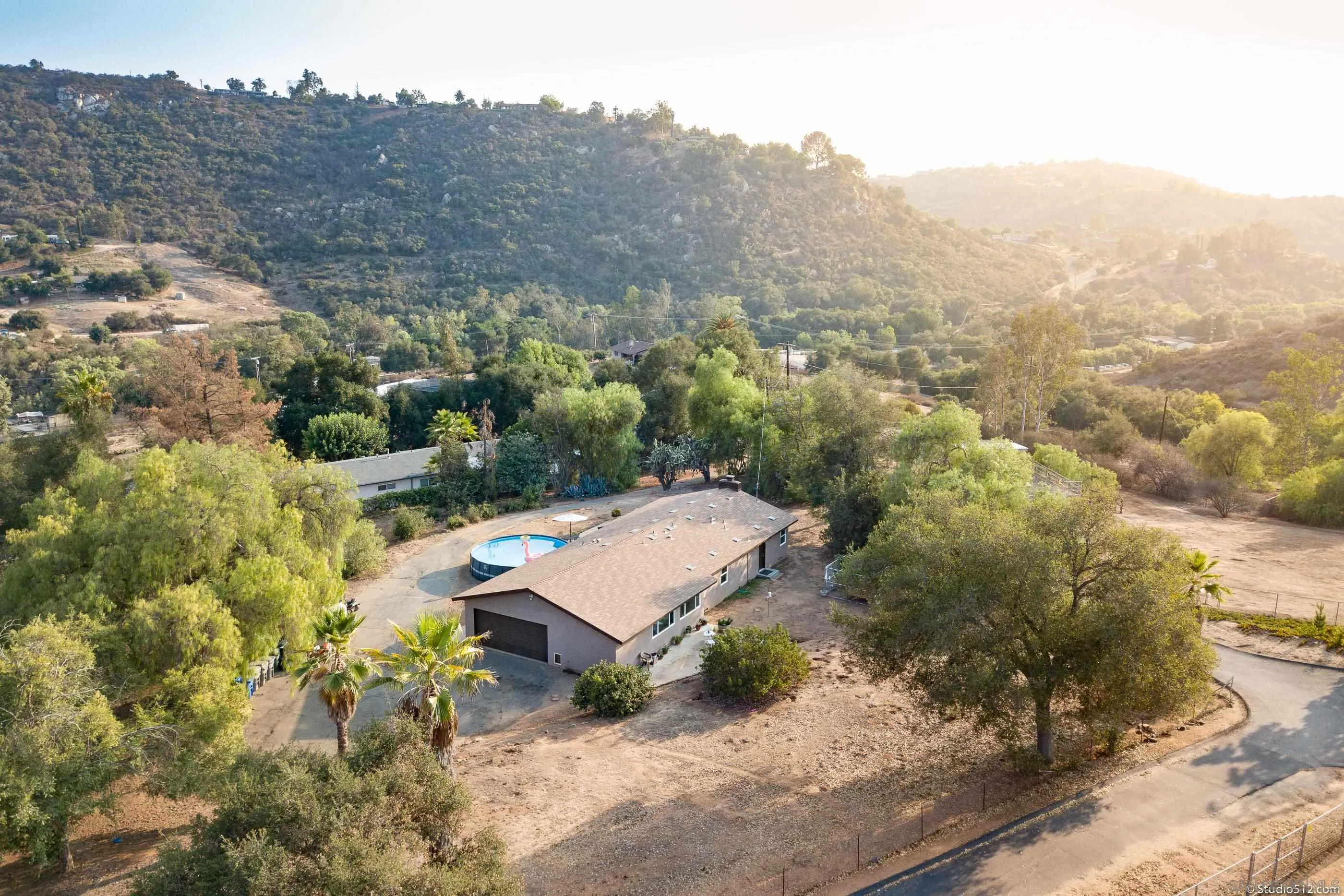 31151 Lilac Road Valley Center, CA 92082 - Photo 2 of 25 an aerial view of a house with a yard