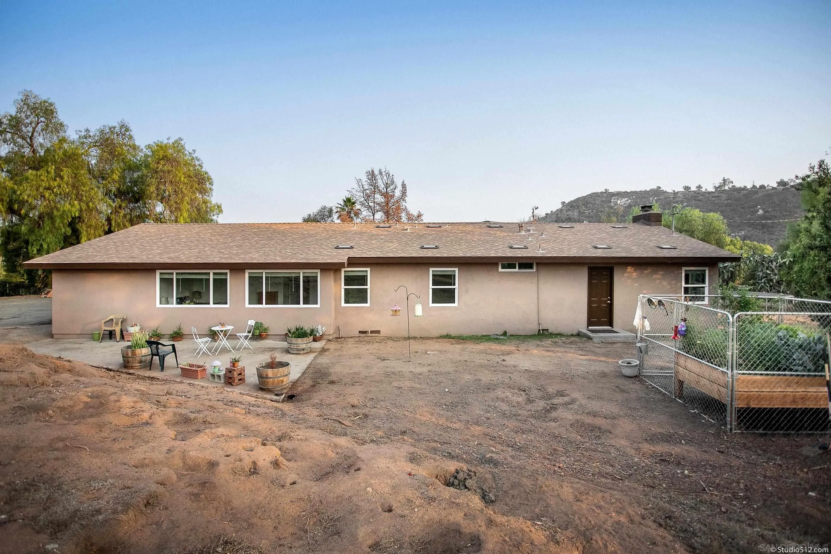 31151 Lilac Road Valley Center, CA 92082 - Photo 24 of 25 a house that has a lot of plants in it