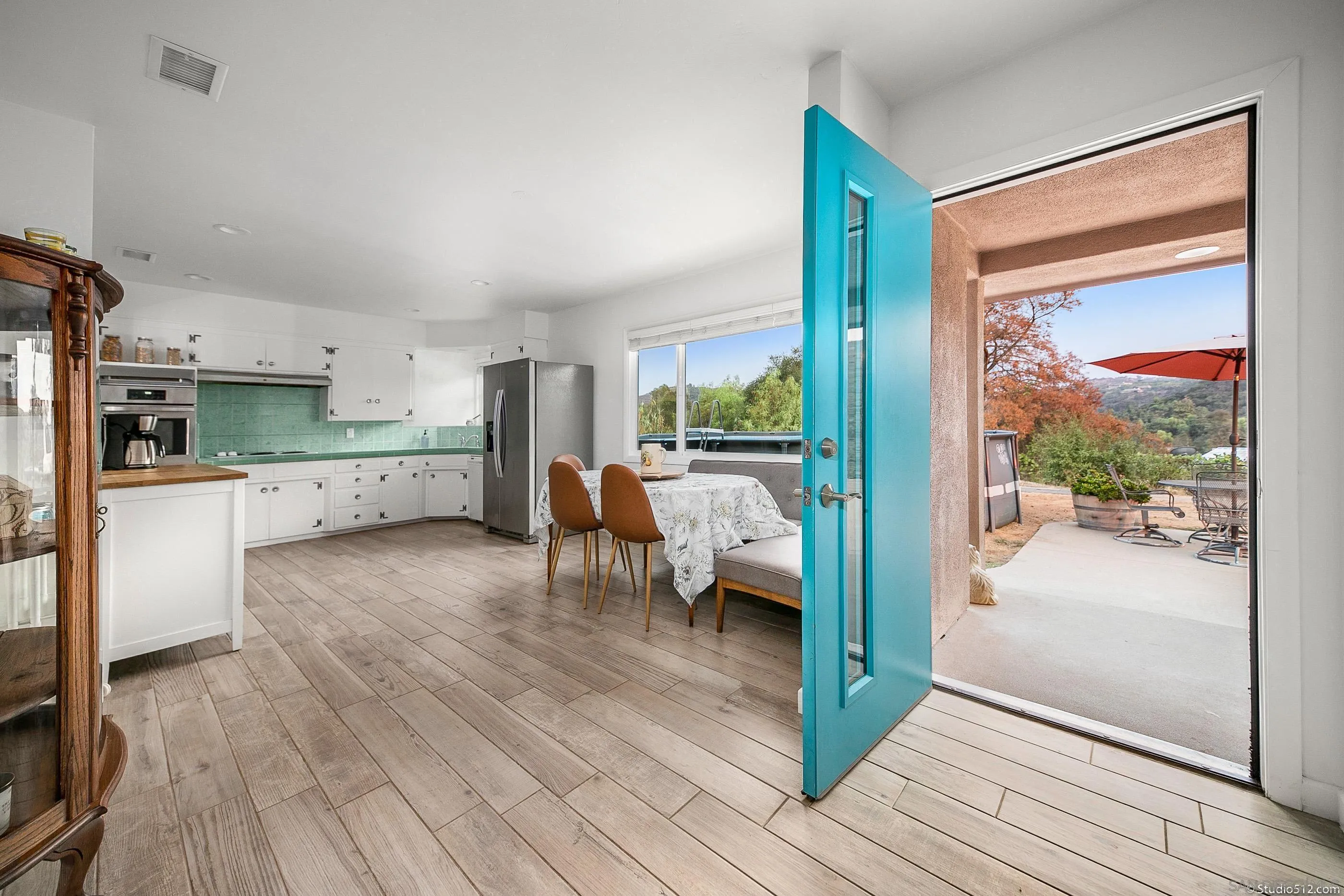 31151 Lilac Road Valley Center, CA 92082 - Photo 7 of 25 a view of a kitchen from the hallway