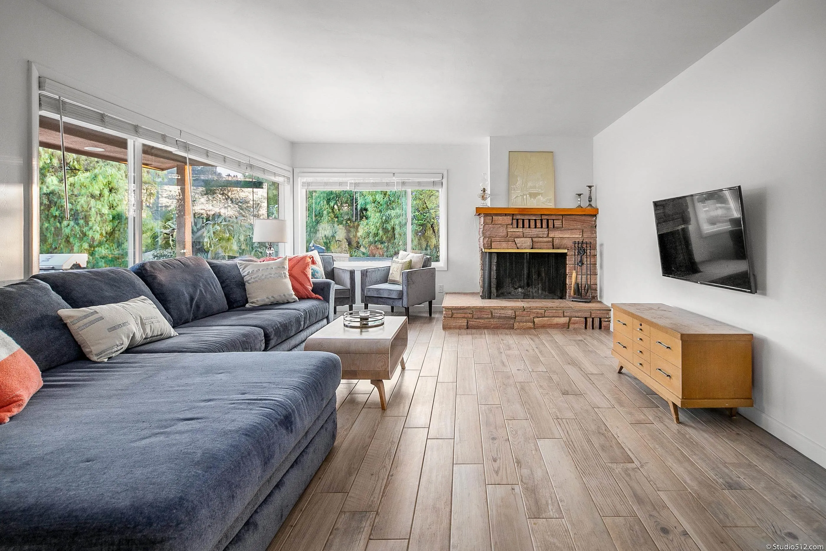 31151 Lilac Road Valley Center, CA 92082 - Photo 8 of 25 a living room with furniture fireplace and flat screen tv