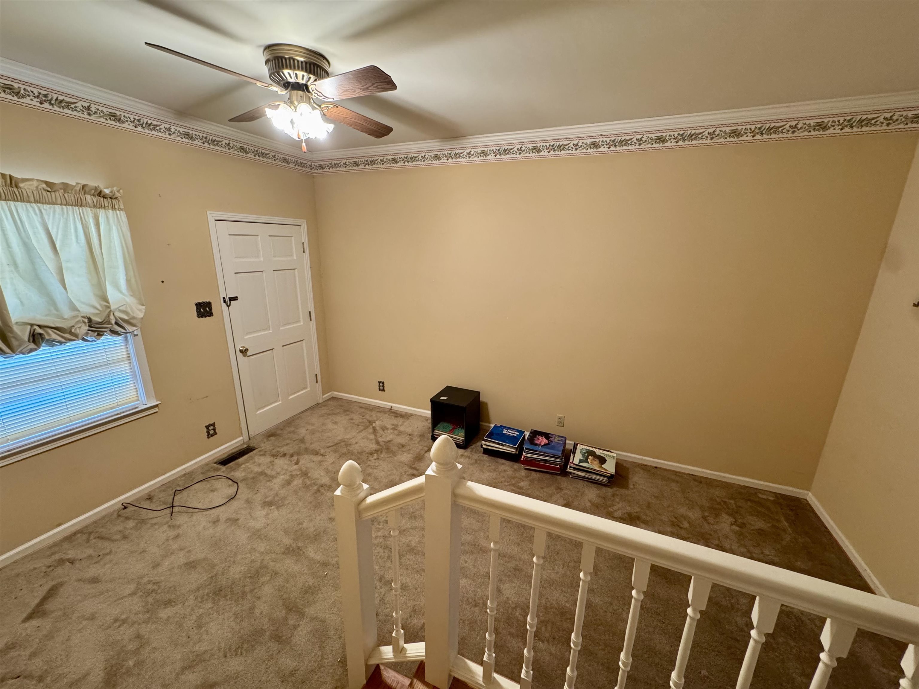 1015 Crestview Street Covington, TN 38019 - Photo 12 of 33 a bathroom with a sink and a mirror