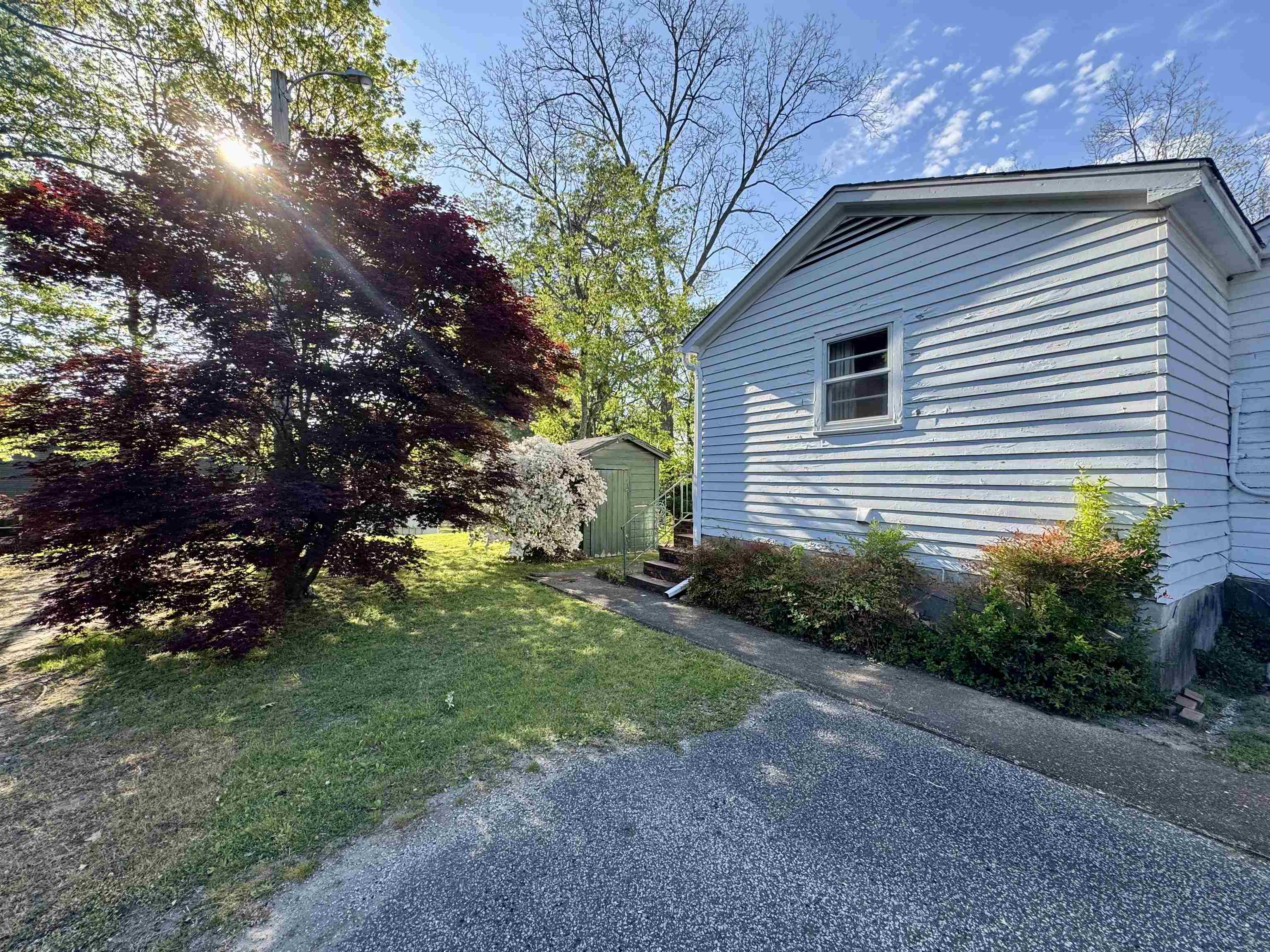 1015 Crestview Street Covington, TN 38019 - Photo 30 of 33 a front view of a house with garden