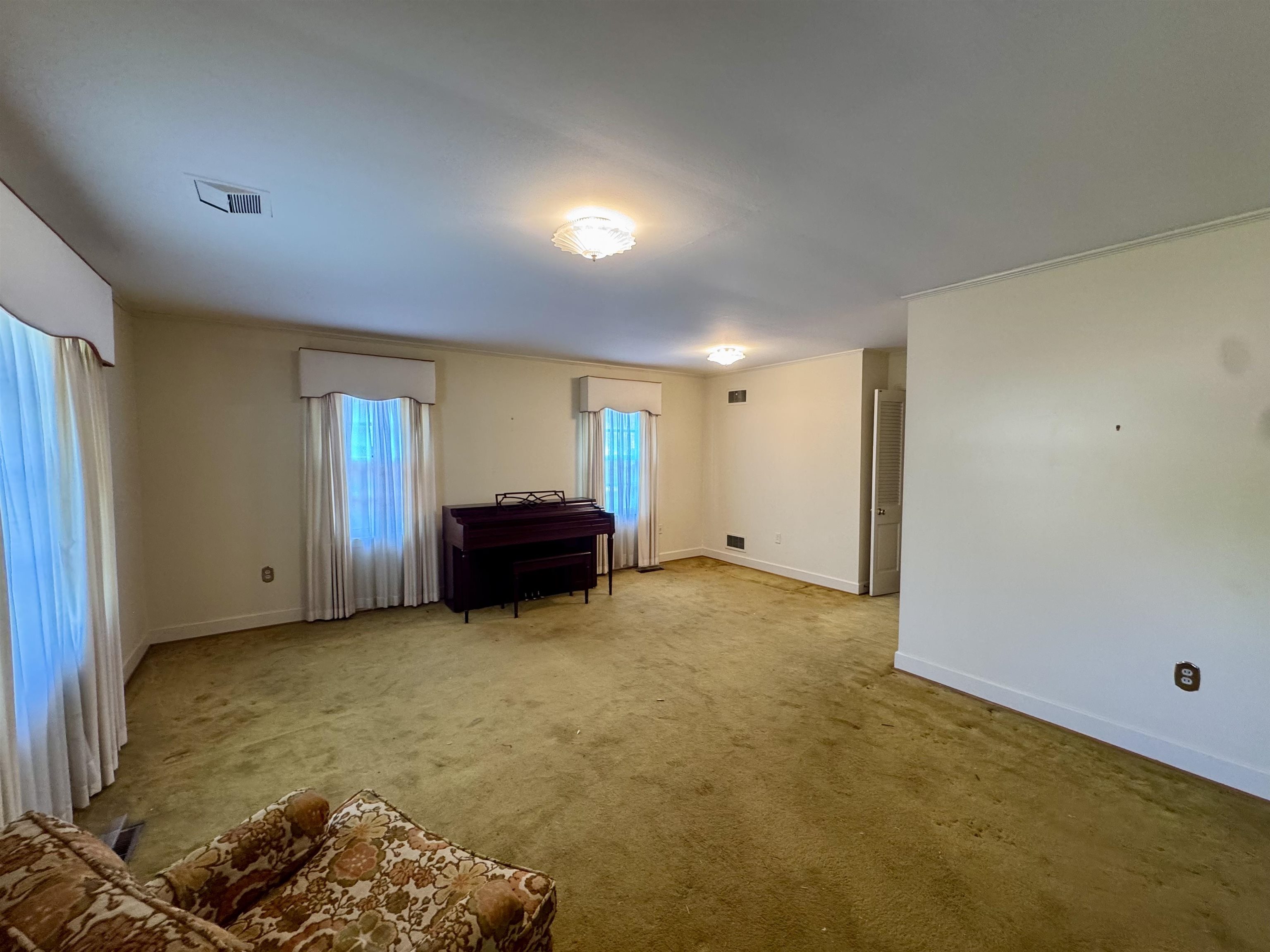 1015 Crestview Street Covington, TN 38019 - Photo 3 of 33 a view of livingroom with hardwood