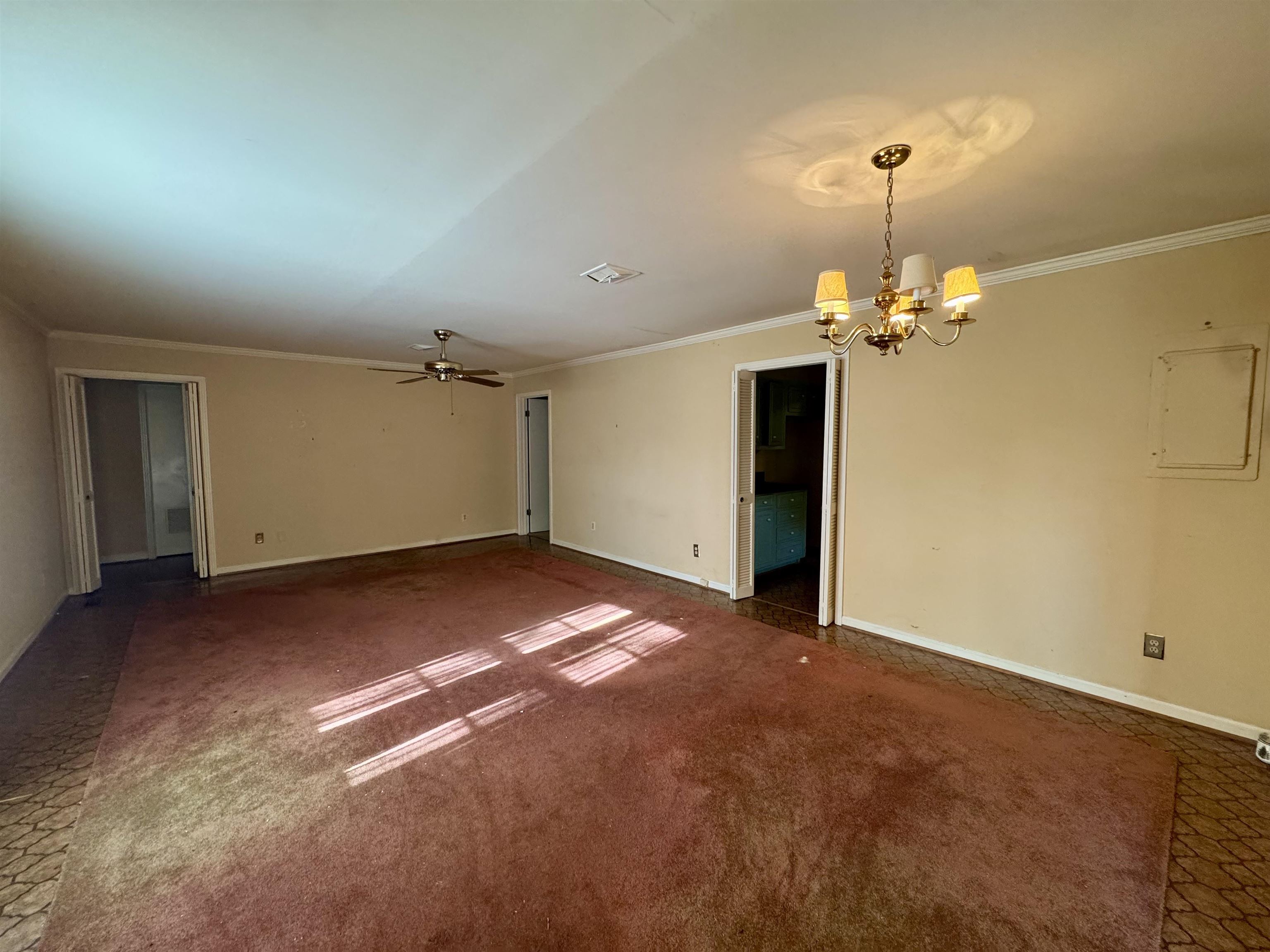 1015 Crestview Street Covington, TN 38019 - Photo 8 of 33 a view of empty room with a mirror