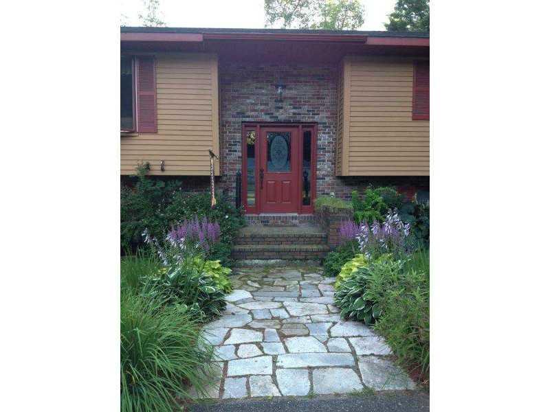 115 Albion Road Waterville, ME 04901 - Photo 2 of 22 Exterior Front. Stone walkway to the...