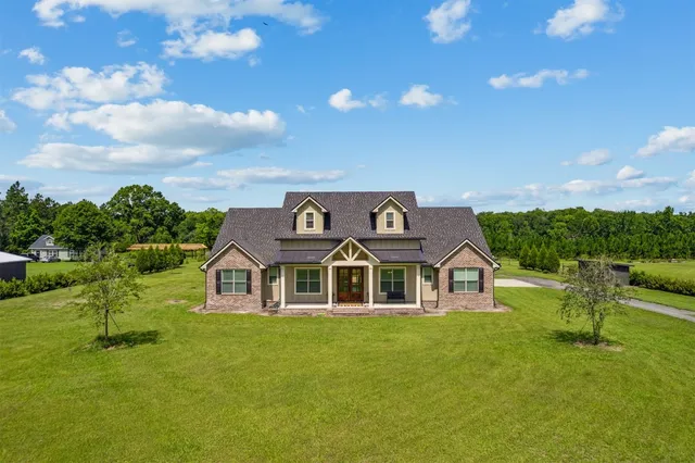 a view of a patio with a backyard