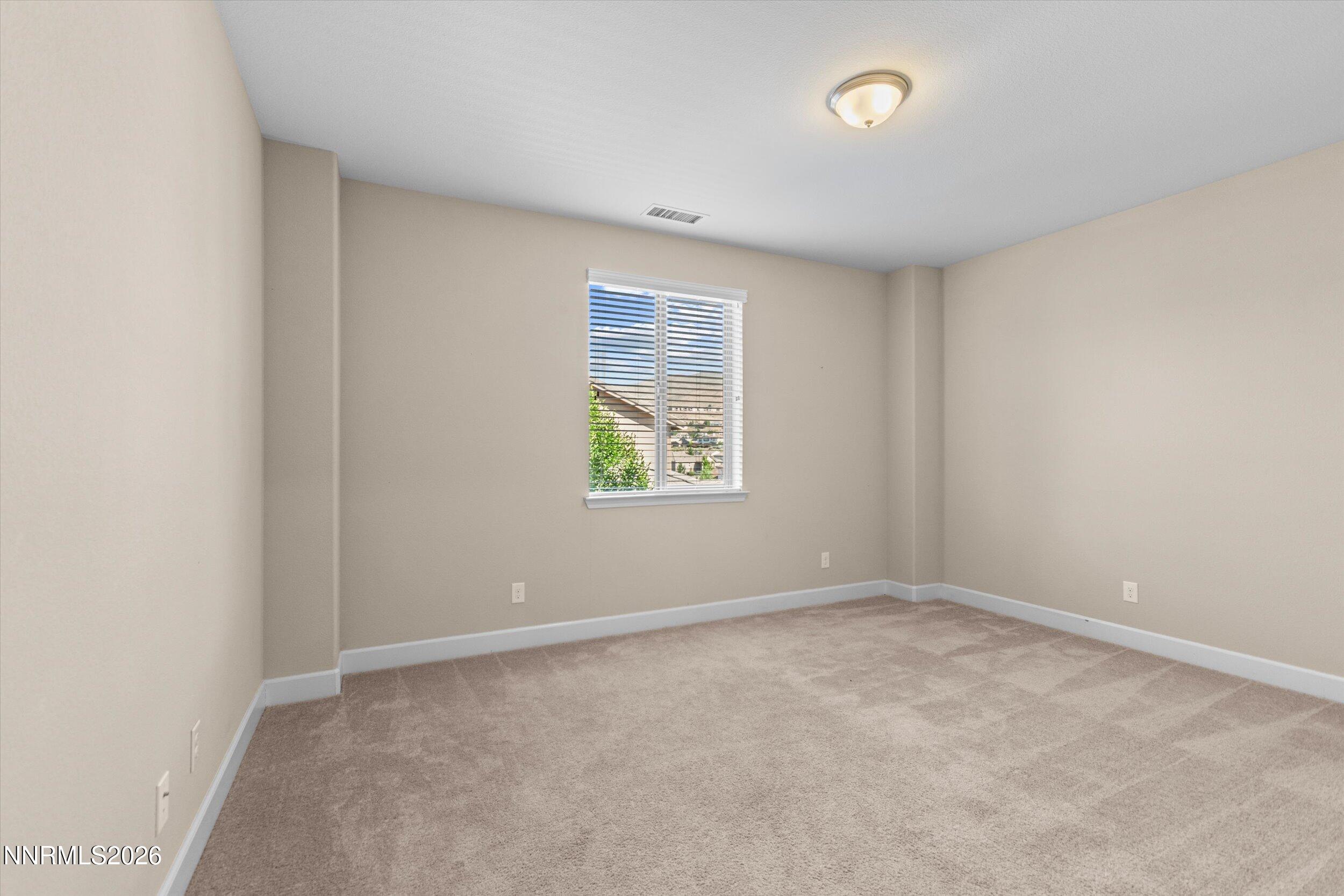1725 Verdi Vista Court Reno, NV 89523 - Photo 24 of 37 an empty room with windows