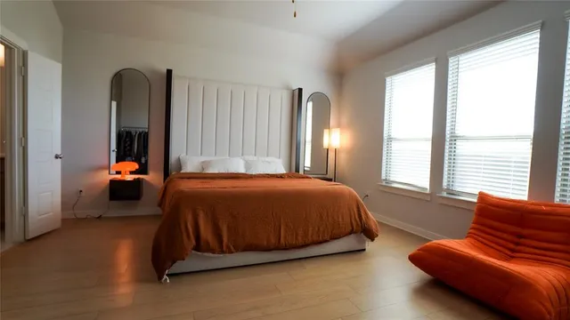 a bed room with a bed and a couch