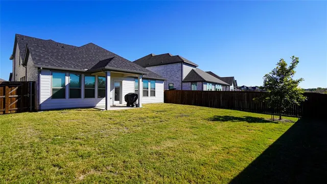 a front view of a house with yard