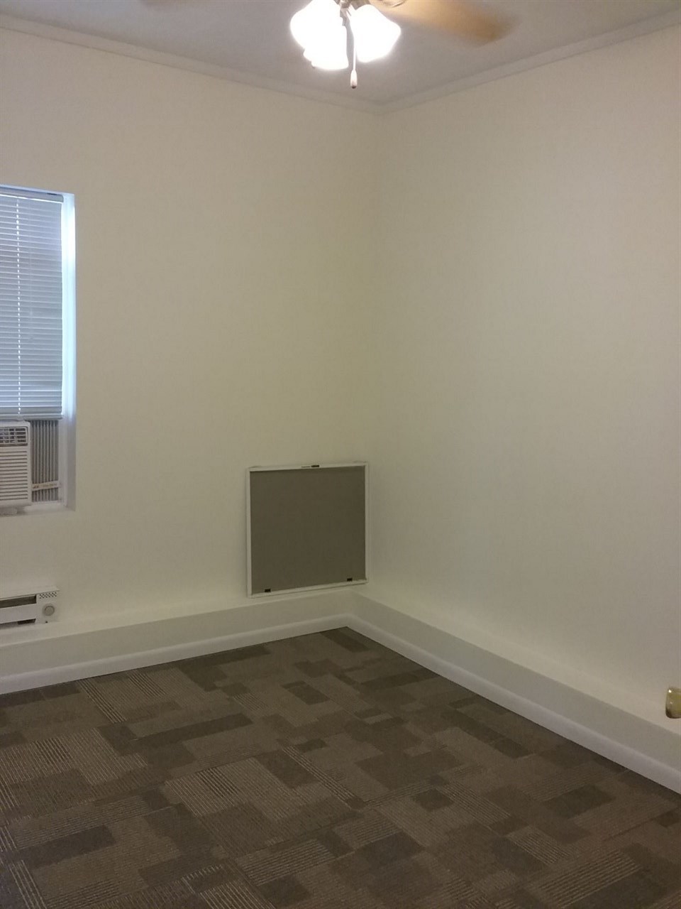 708 Pines Road Oregon, IL 61061 - Photo 14 of 22 an empty room with a empty space and a window