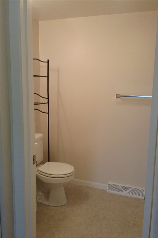 708 Pines Road Oregon, IL 61061 - Photo 3 of 22 a bathroom with a toilet and a shower