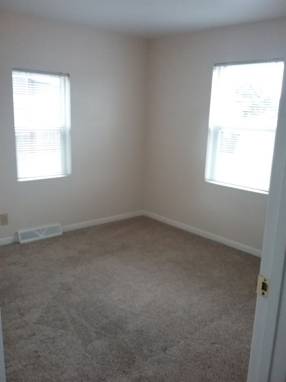 708 Pines Road Oregon, IL 61061 - Photo 5 of 22 an empty room with a window