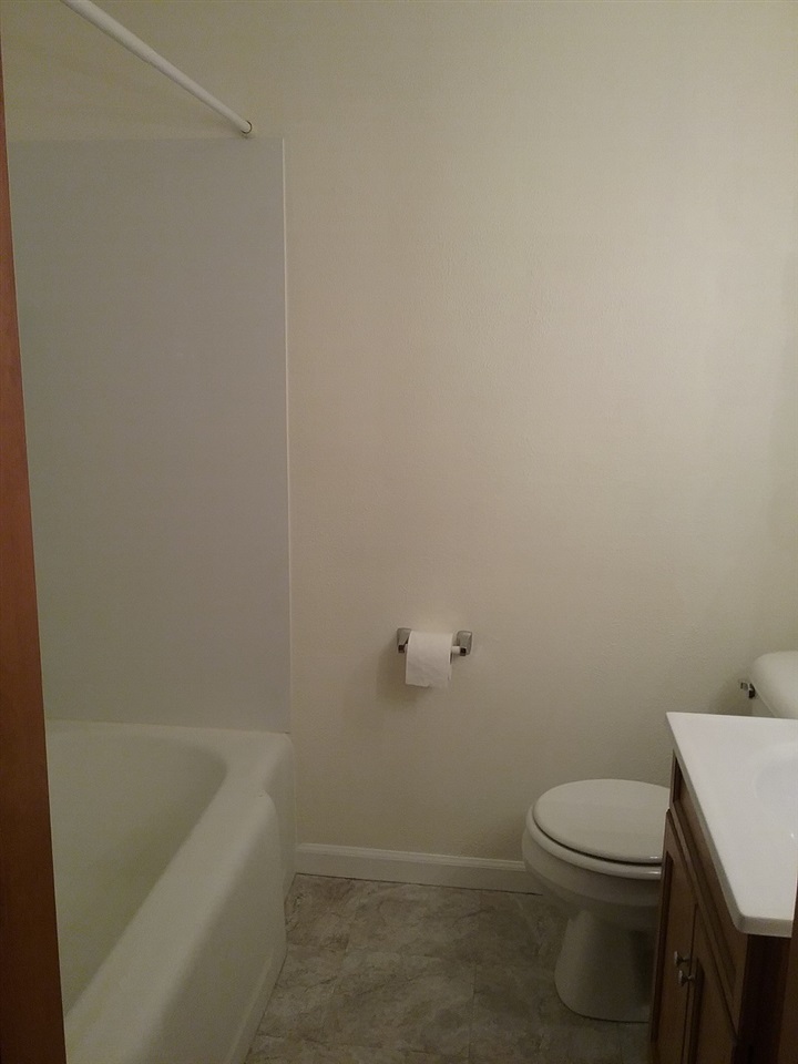 708 Pines Road Oregon, IL 61061 - Photo 7 of 22 a white toilet sitting next to a bath tub