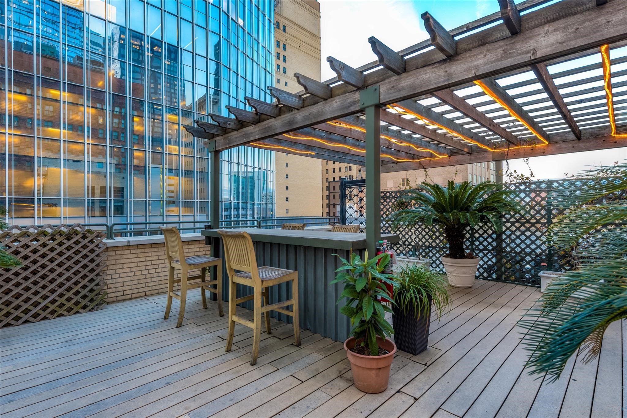 705 Main Street, Unit 302 Houston, TX 77002 - Photo 15 of 23 Rooftop deck. Perfect for entertaining.