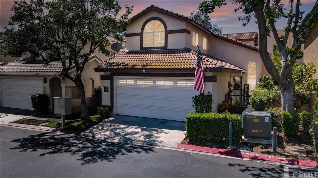 6197 Ritter Path Chino Hills, CA 91709 - Photo 1 of 1 a view of a house with a yard garage and outdoor seating
