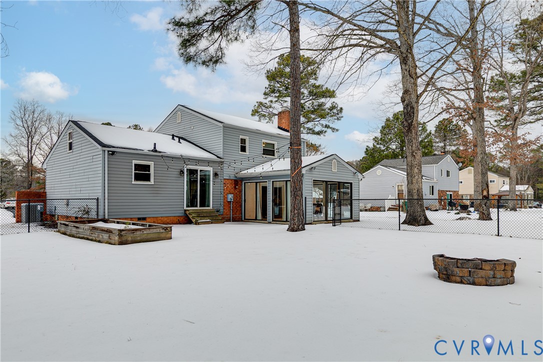 10907 Baxter Road Glen Allen, VA 23060 - Photo 41 of 42 a view of a house with a snow on the road