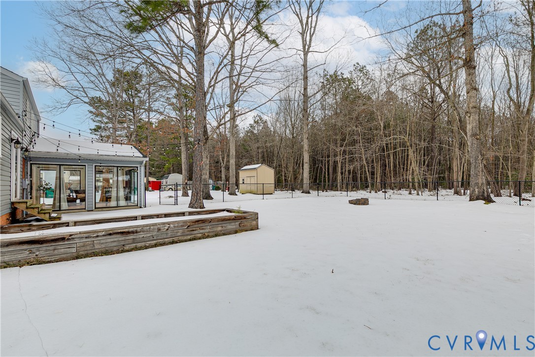 10907 Baxter Road Glen Allen, VA 23060 - Photo 42 of 42 Back yard Fenced w/ patio & Privacy Behind