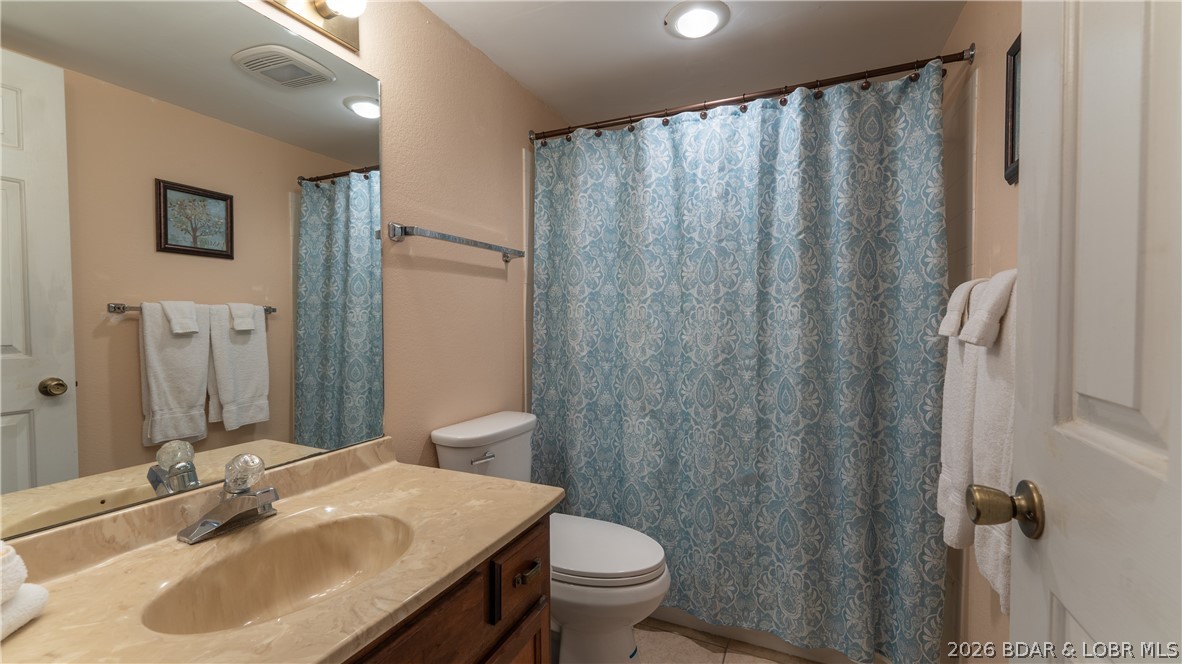 5940 Baydy Peak Road, Unit 123 Osage Beach, MO 65065 - Photo 13 of 43 Master bath