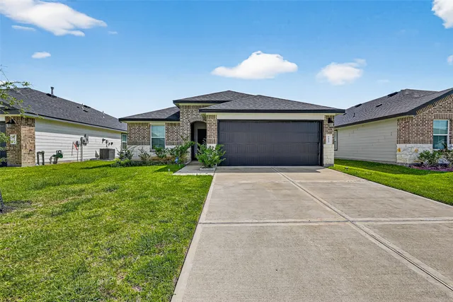 a front view of house with yard