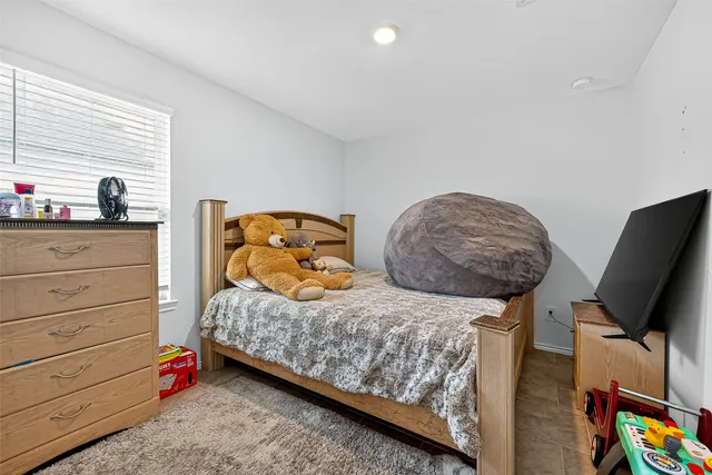 a view of a house with a backyard and a garden