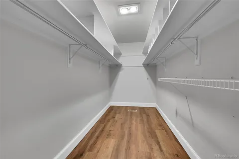 a view of wooden floor in hallway