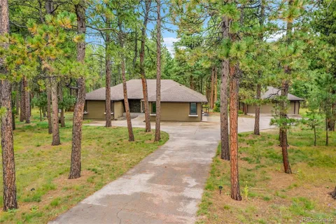 a view of a yard with an outdoor space