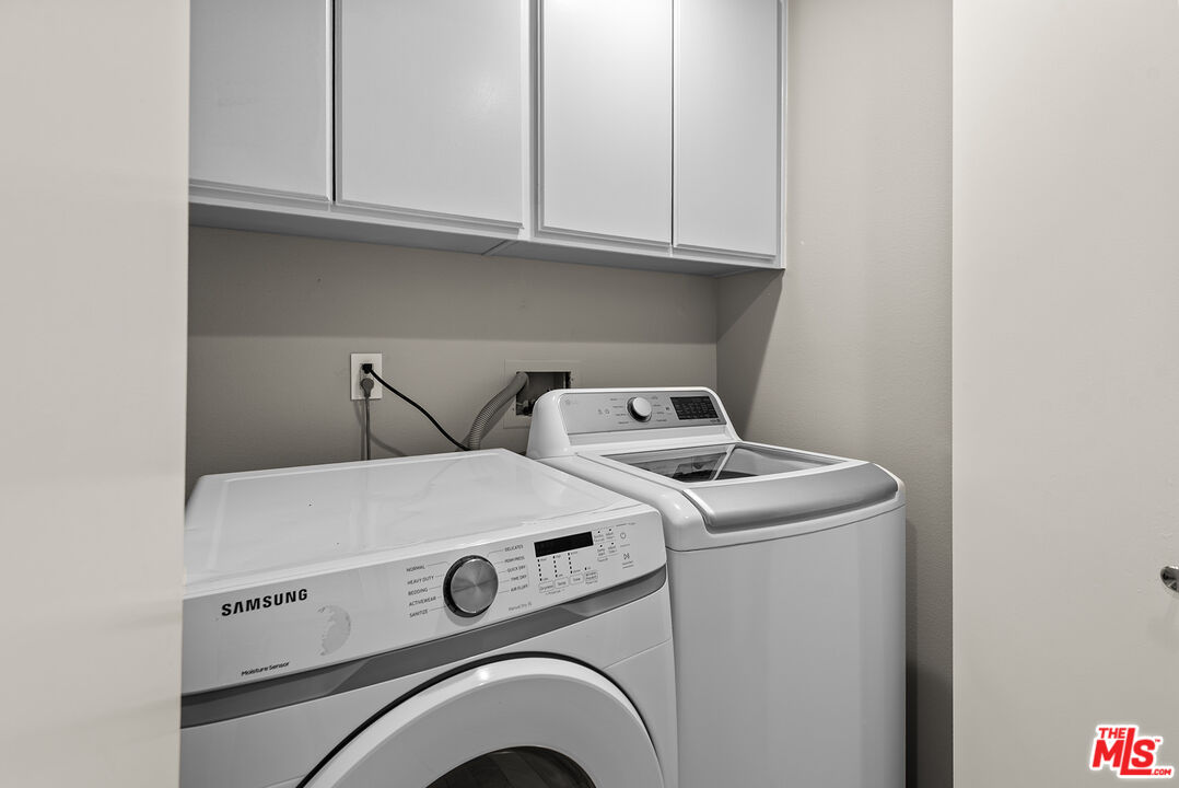 1875 South Beverly Glen Boulevard, Unit 106 Los Angeles, CA 90025 - Photo 20 of 30 a utility room with dryer and washer