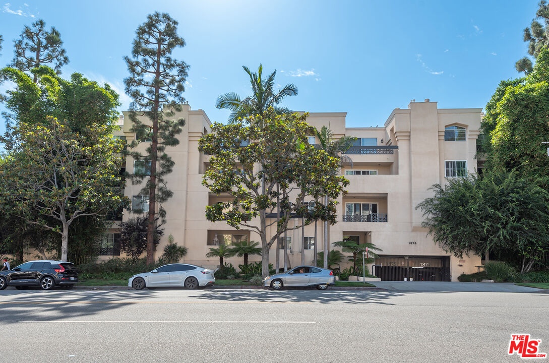 1875 South Beverly Glen Boulevard, Unit 106 Los Angeles, CA 90025 - Photo 2 of 30 a car parked in front of a building
