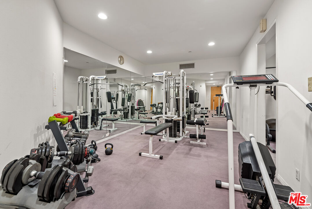 1875 South Beverly Glen Boulevard, Unit 106 Los Angeles, CA 90025 - Photo 28 of 30 a view of a room with gym equipment