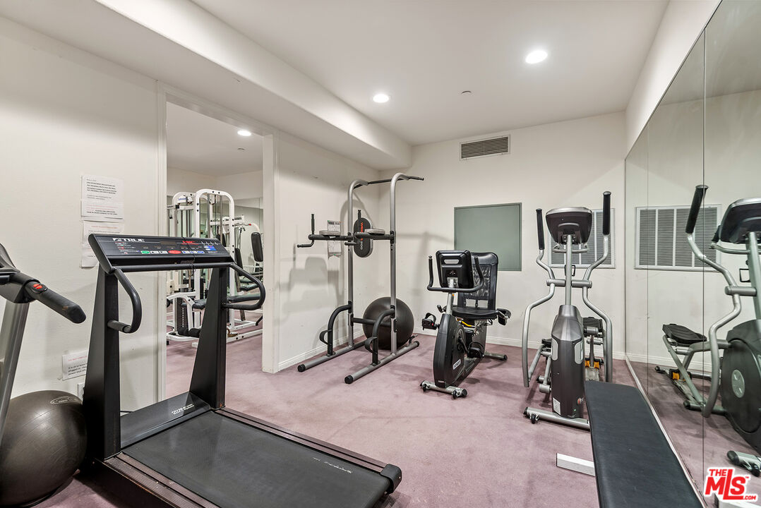 1875 South Beverly Glen Boulevard, Unit 106 Los Angeles, CA 90025 - Photo 29 of 30 a view of a room with gym equipment