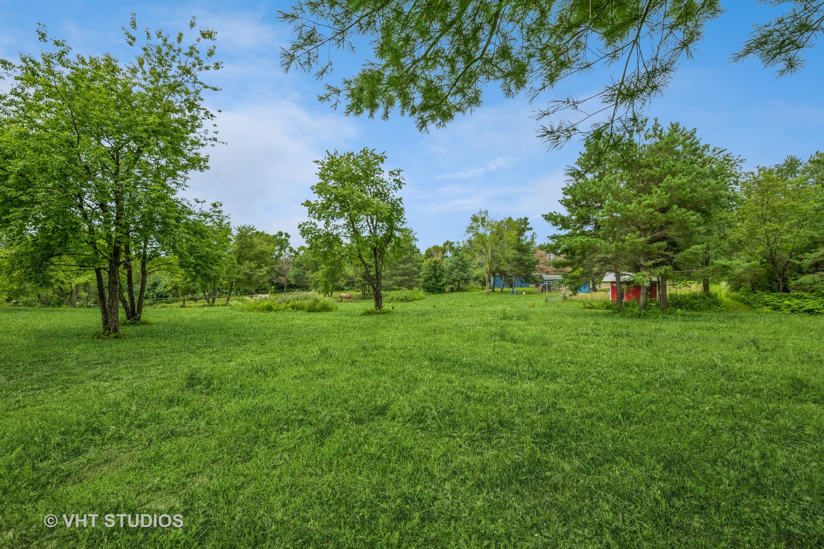 18809 Il Route 173 Harvard, IL 60033 - Photo 11 of 11 a view of green field with trees
