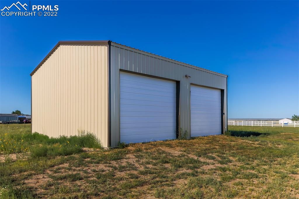 703 Buffalo Run Road Calhan, CO 80808 - Photo 4 of 25 a view of wooden door