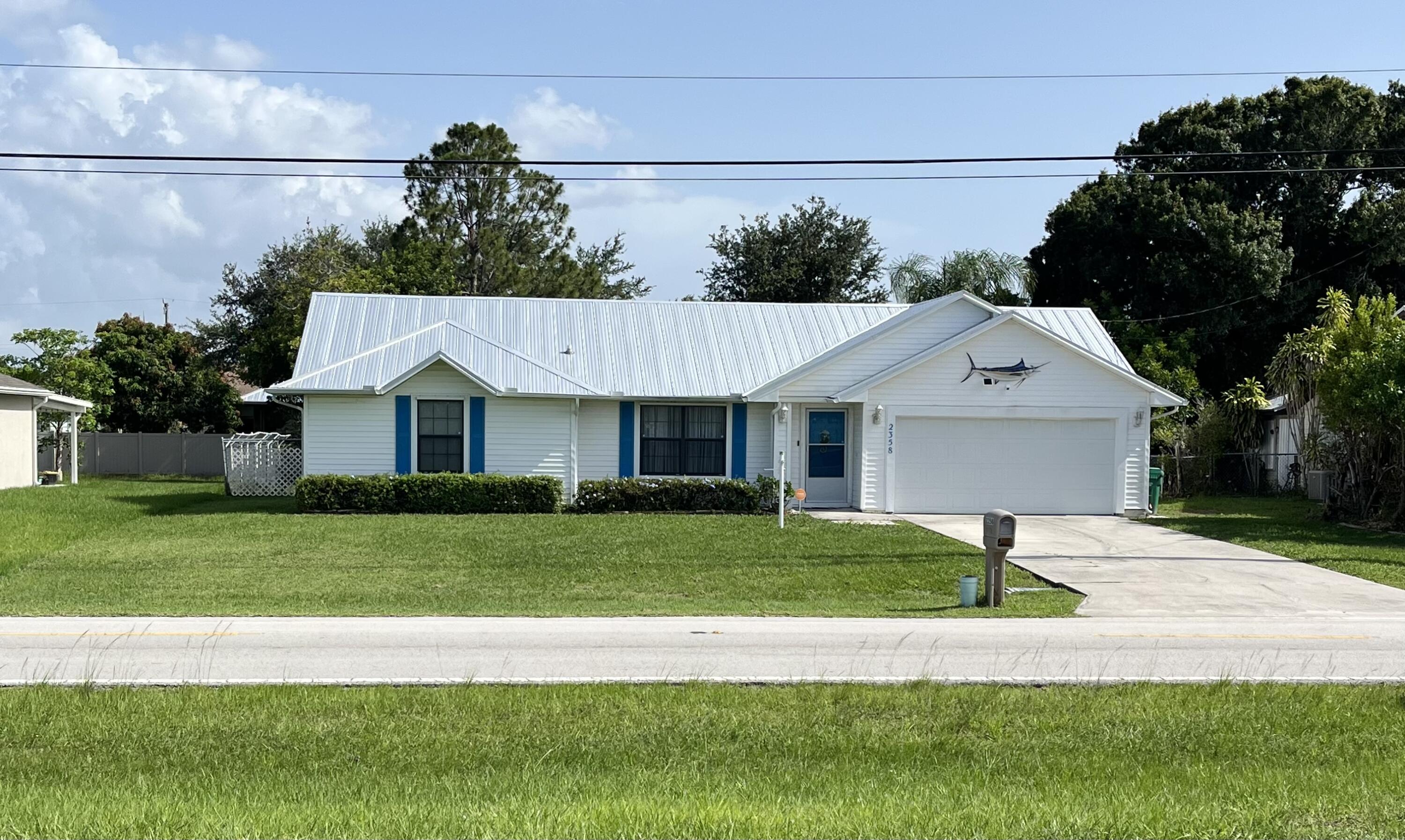 2358 Southeast Tiffany Avenue Port St. Lucie, FL 34952 - Photo 1 of 15 Front