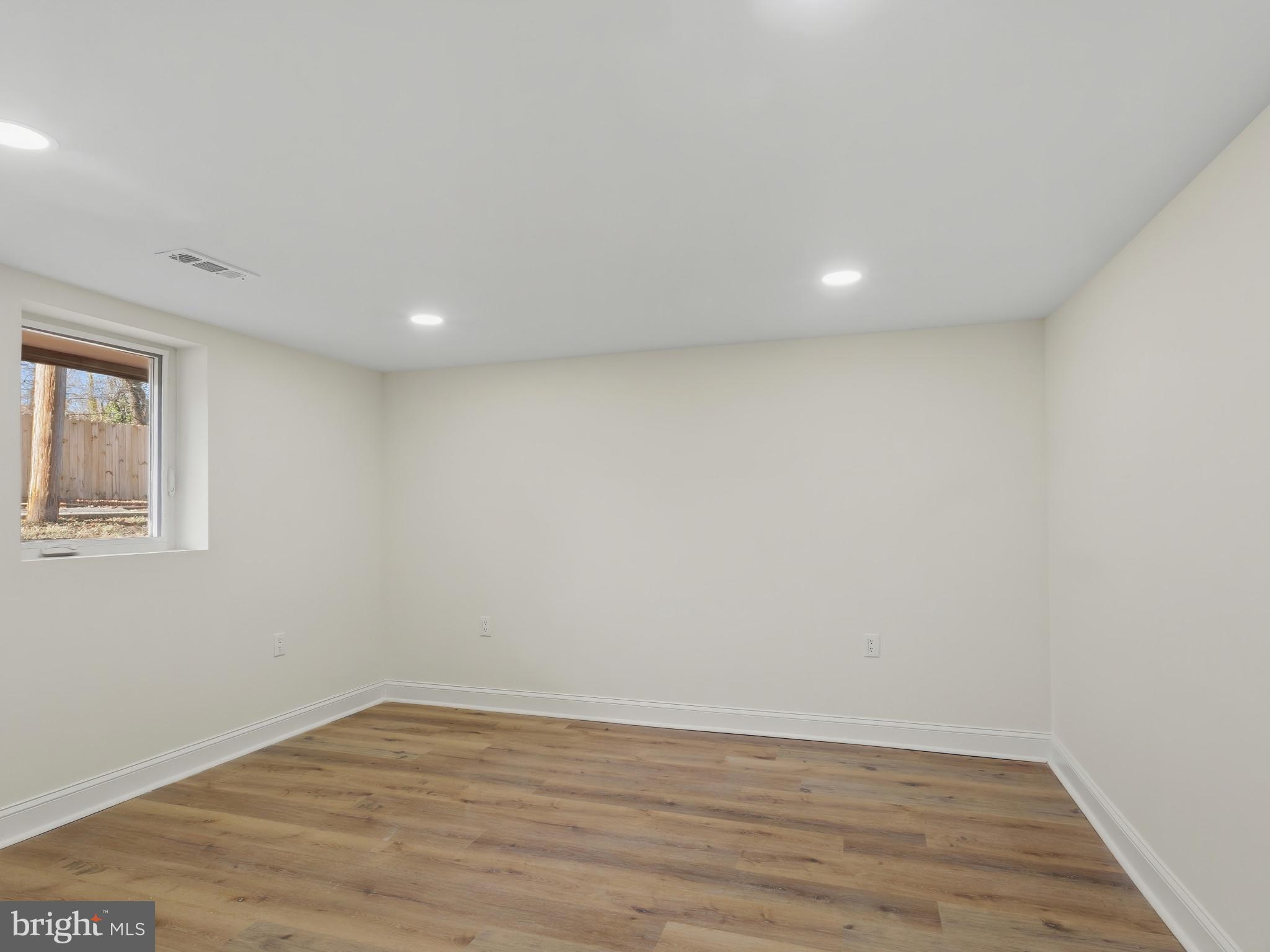 4600 White Avenue Baltimore, MD 21206 - Photo 30 of 40 a view of an empty room with wooden floor and closet