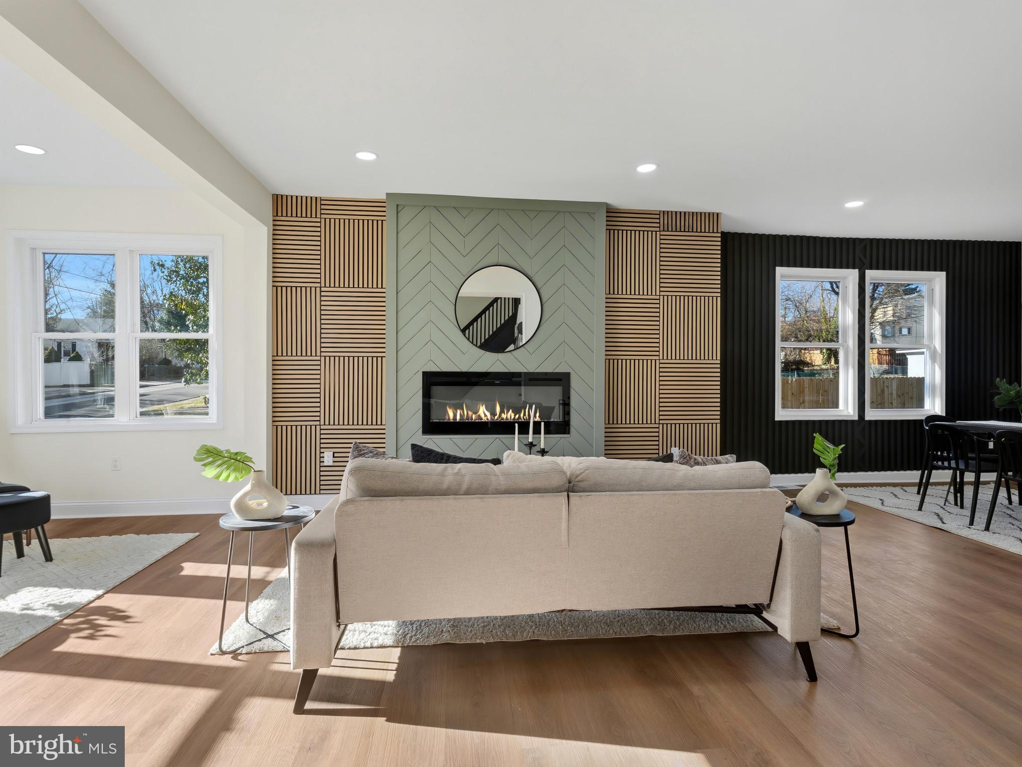 4600 White Avenue Baltimore, MD 21206 - Photo 6 of 40 a living room with fireplace furniture and a large window