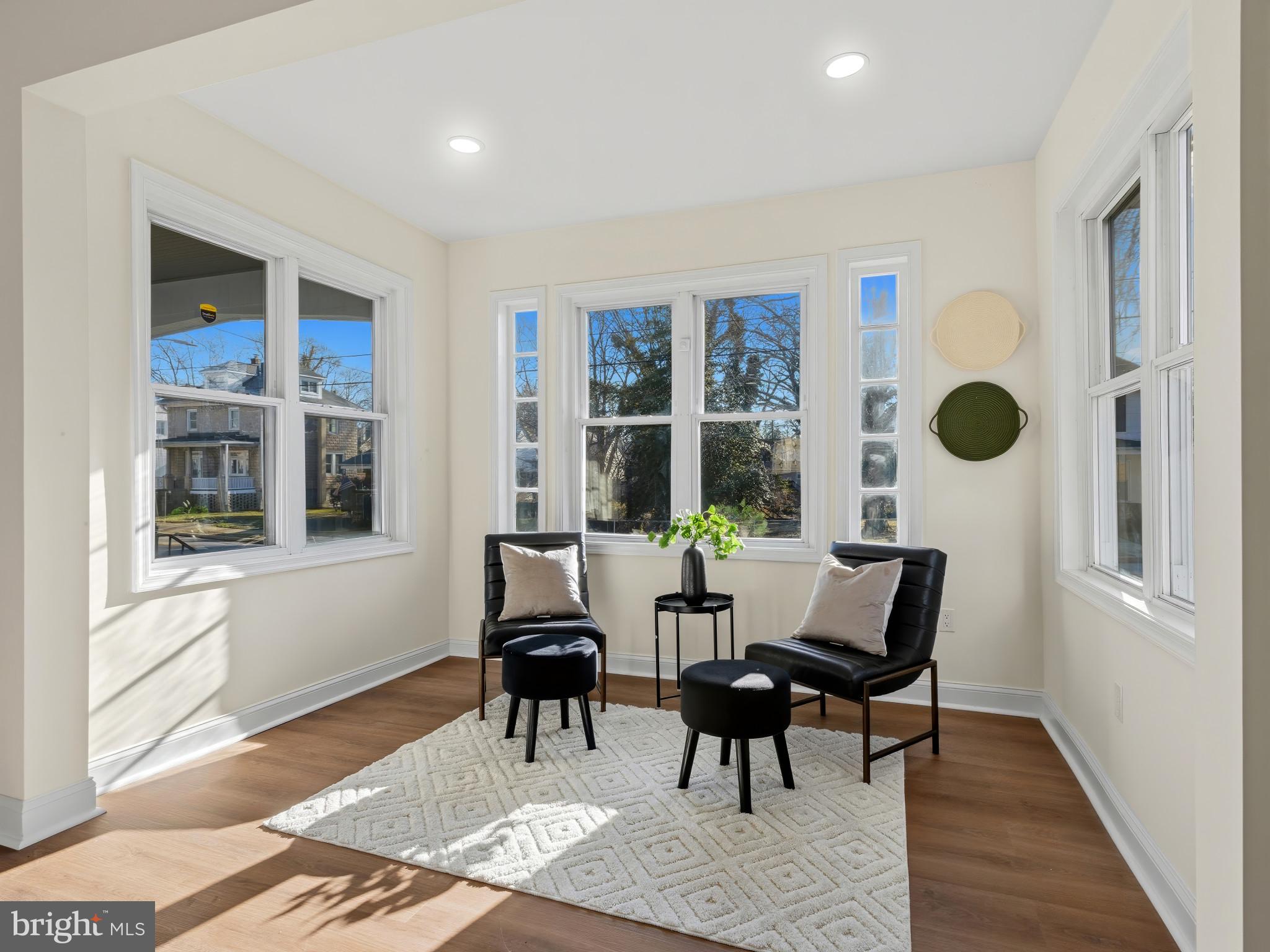 4600 White Avenue Baltimore, MD 21206 - Photo 8 of 40 a living room with furniture and a window