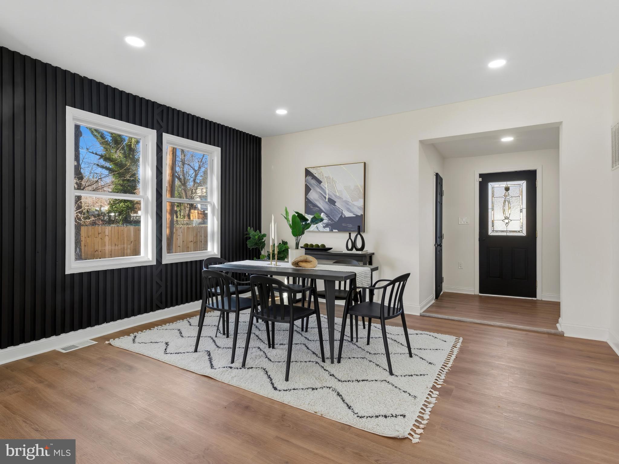 4600 White Avenue Baltimore, MD 21206 - Photo 9 of 40 a view of a dining room with furniture window and wooden floor