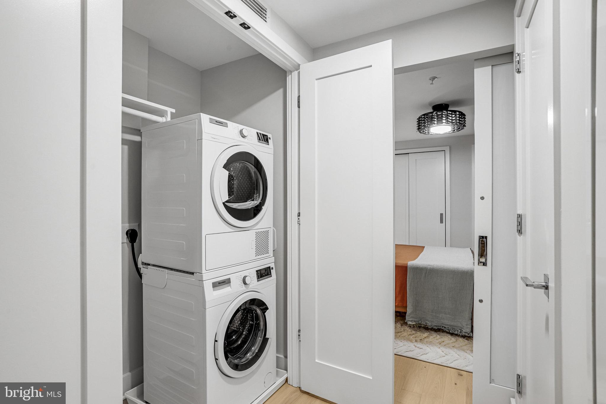 1211 Van Street Southeast, Unit 501 Washington, DC 20003 - Photo 12 of 37 a utility room with dryer and washer