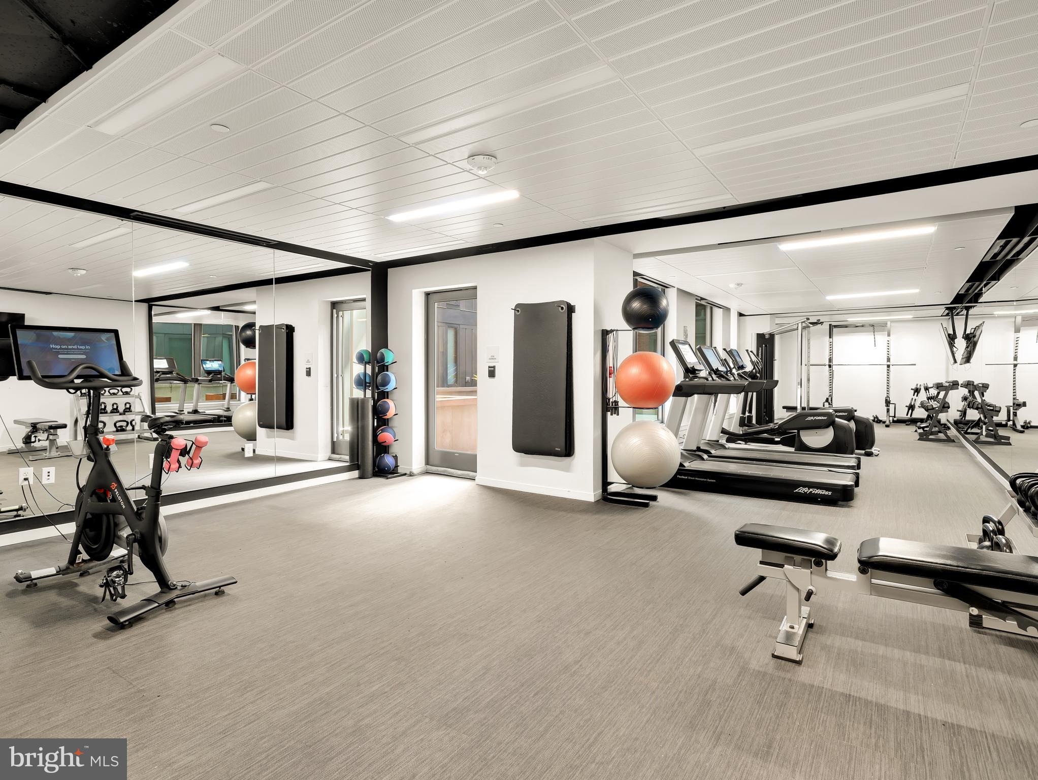 1211 Van Street Southeast, Unit 501 Washington, DC 20003 - Photo 16 of 37 a view of a room with gym equipment