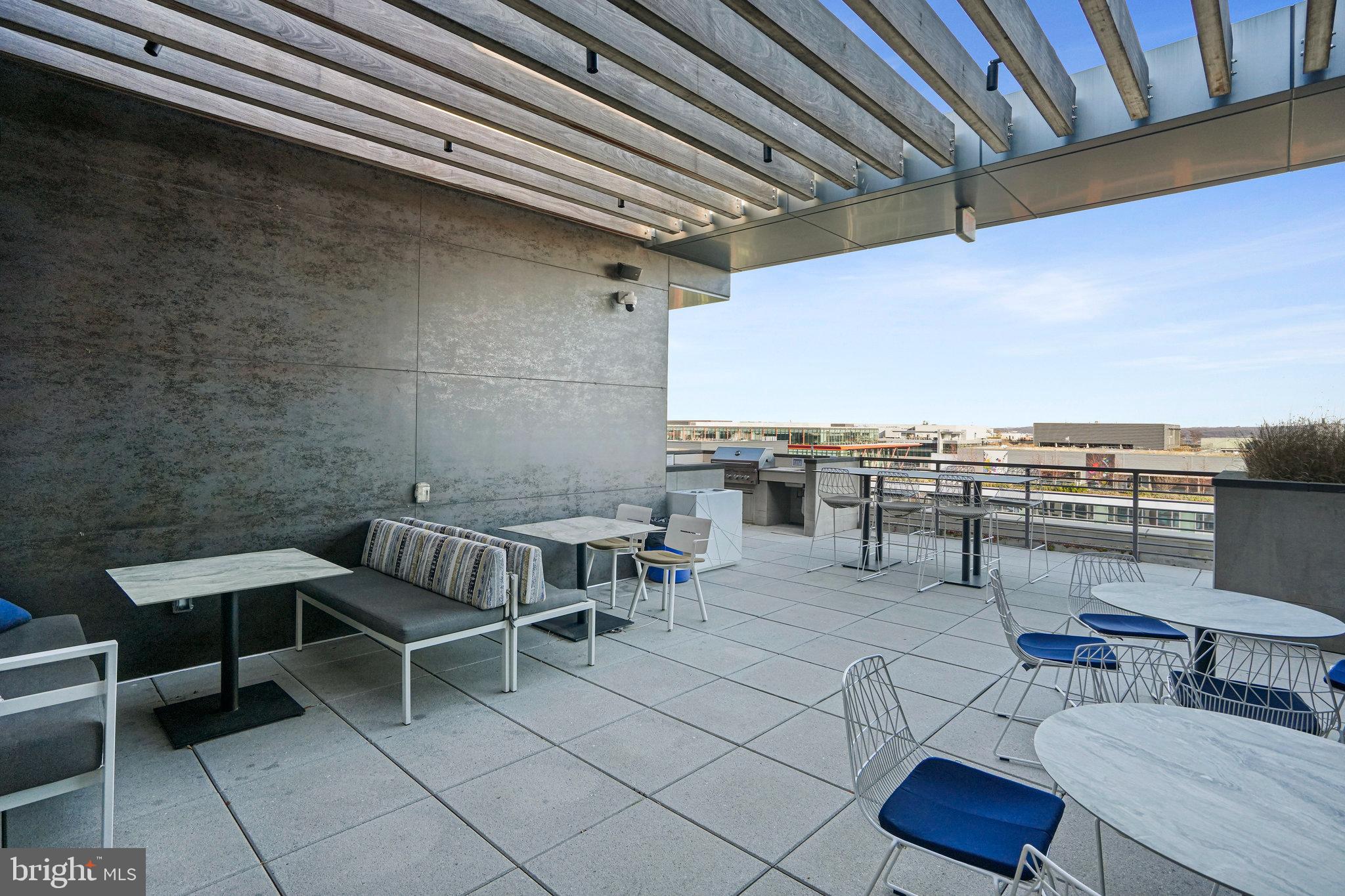 1211 Van Street Southeast, Unit 501 Washington, DC 20003 - Photo 17 of 37 a outdoor space with chairs