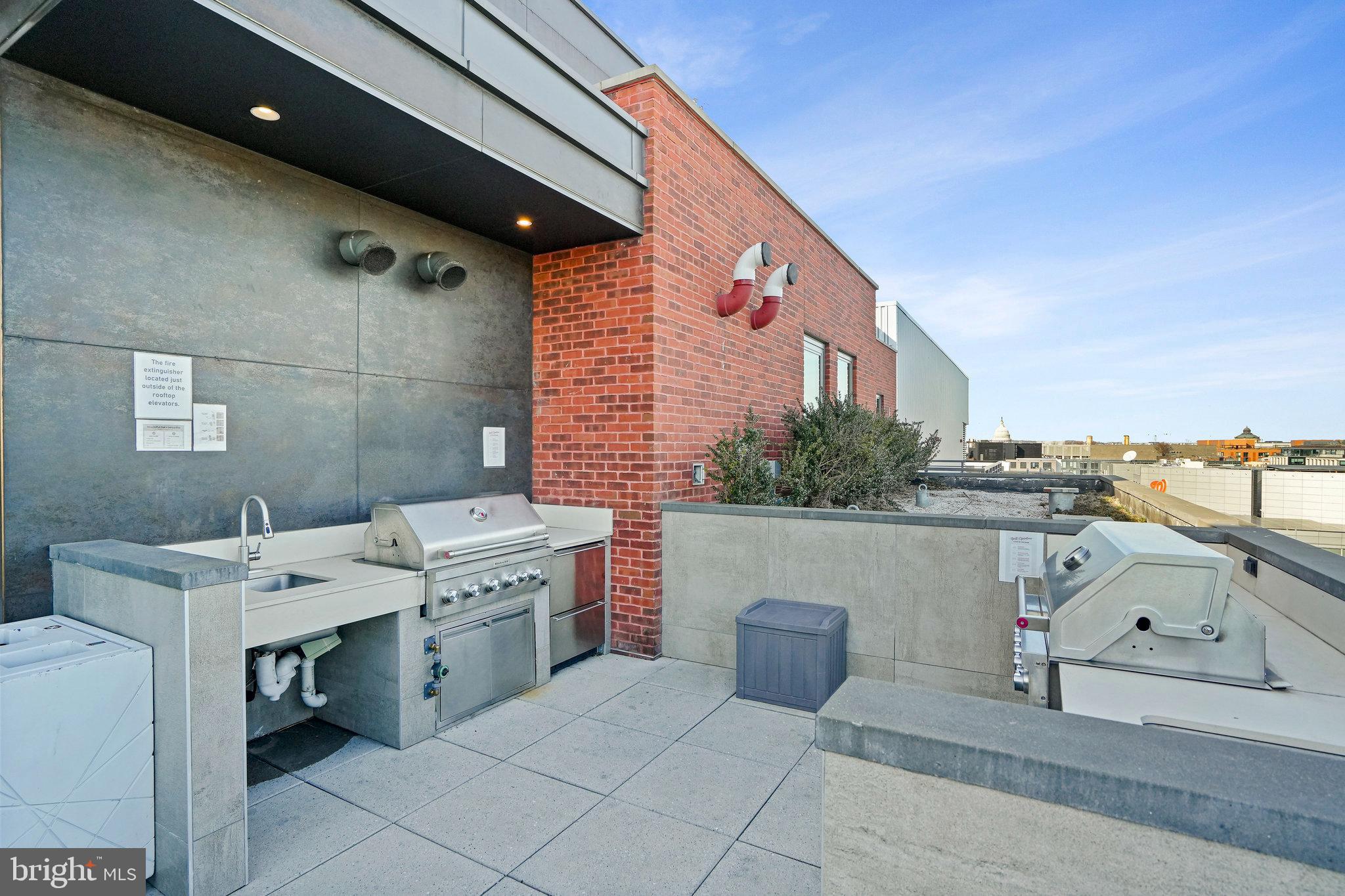 1211 Van Street Southeast, Unit 501 Washington, DC 20003 - Photo 18 of 37 a utility room with dryer and washer