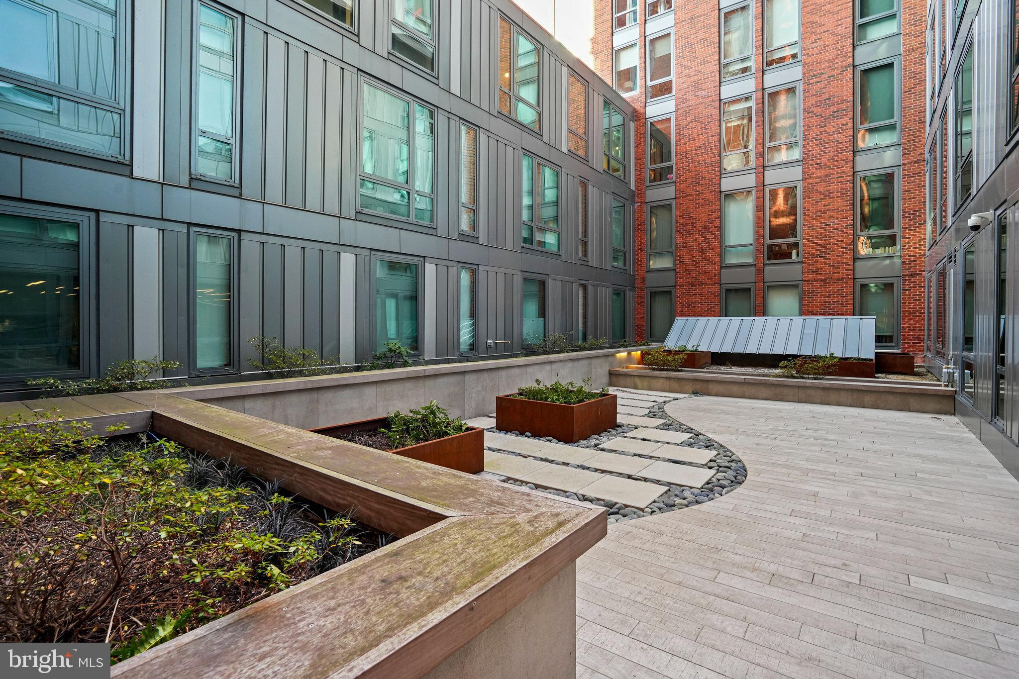 1211 Van Street Southeast, Unit 501 Washington, DC 20003 - Photo 26 of 37 a view of a back yard of the house