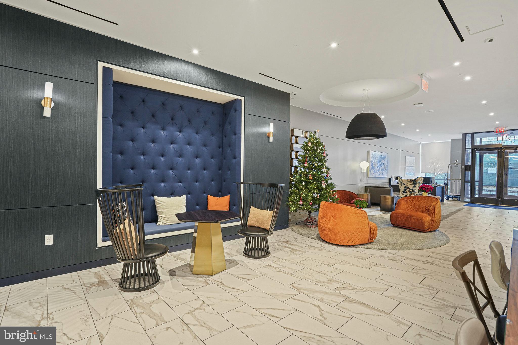 1211 Van Street Southeast, Unit 501 Washington, DC 20003 - Photo 27 of 37 a kitchen with a table and chairs