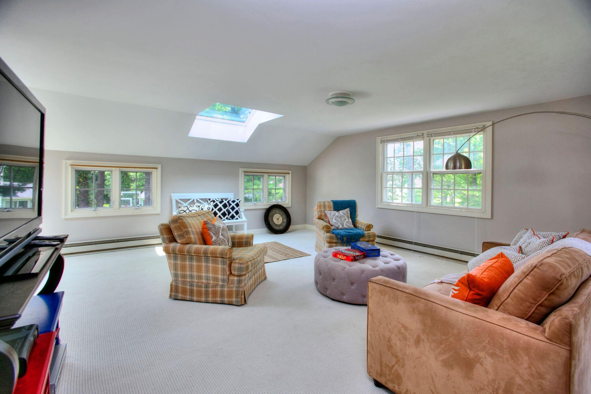 5 Haskell Lane Darien, CT 06820 - Photo 11 of 22 a living room with furniture chess board and a window