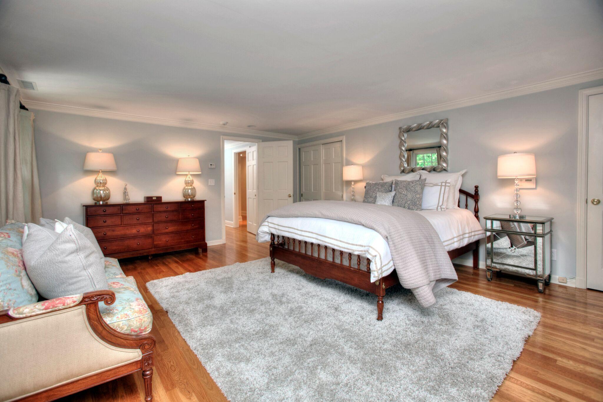 5 Haskell Lane Darien, CT 06820 - Photo 12 of 22 a bedroom with a bed and window