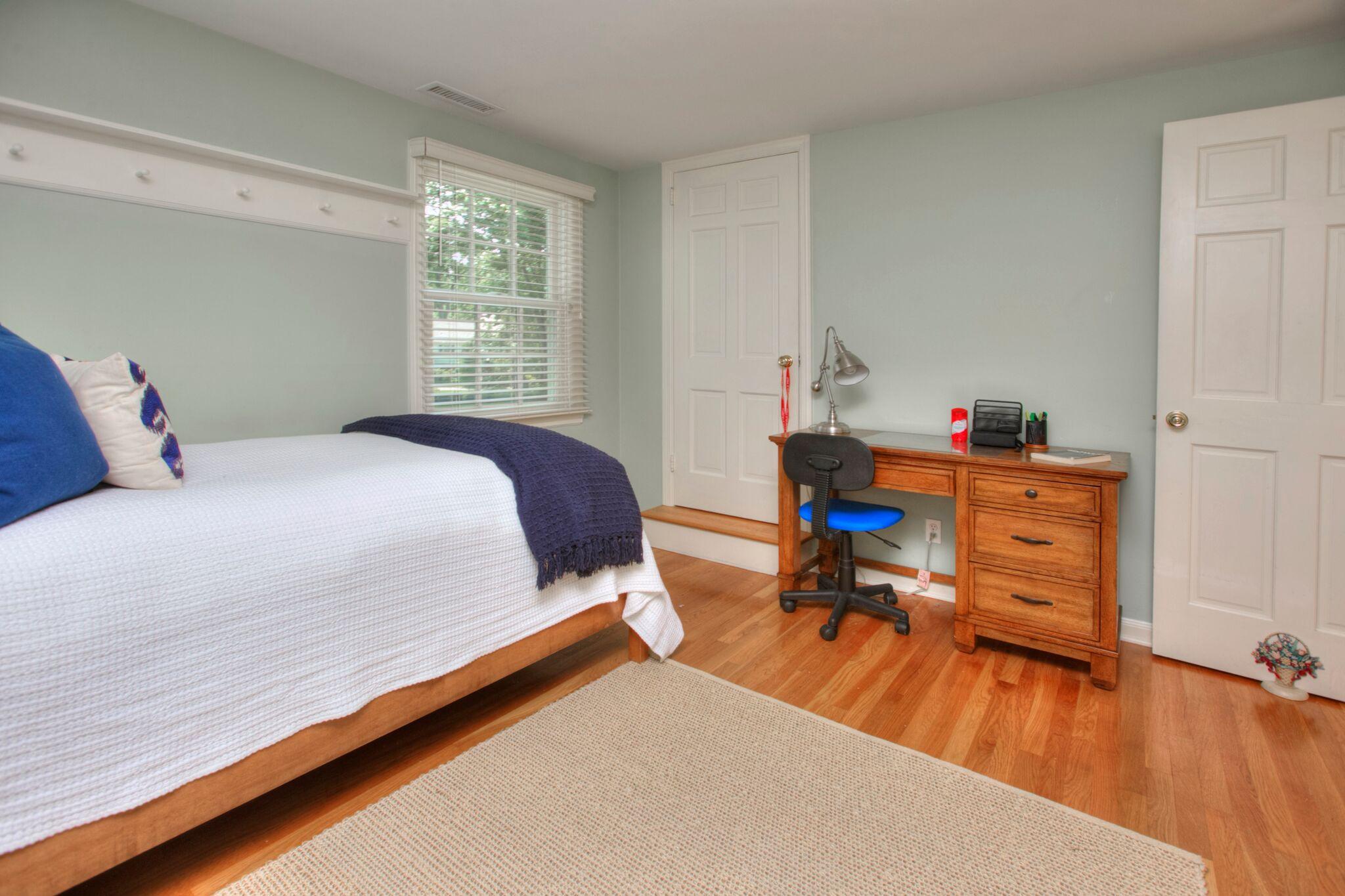 5 Haskell Lane Darien, CT 06820 - Photo 15 of 22 a bed room with a bed and a window