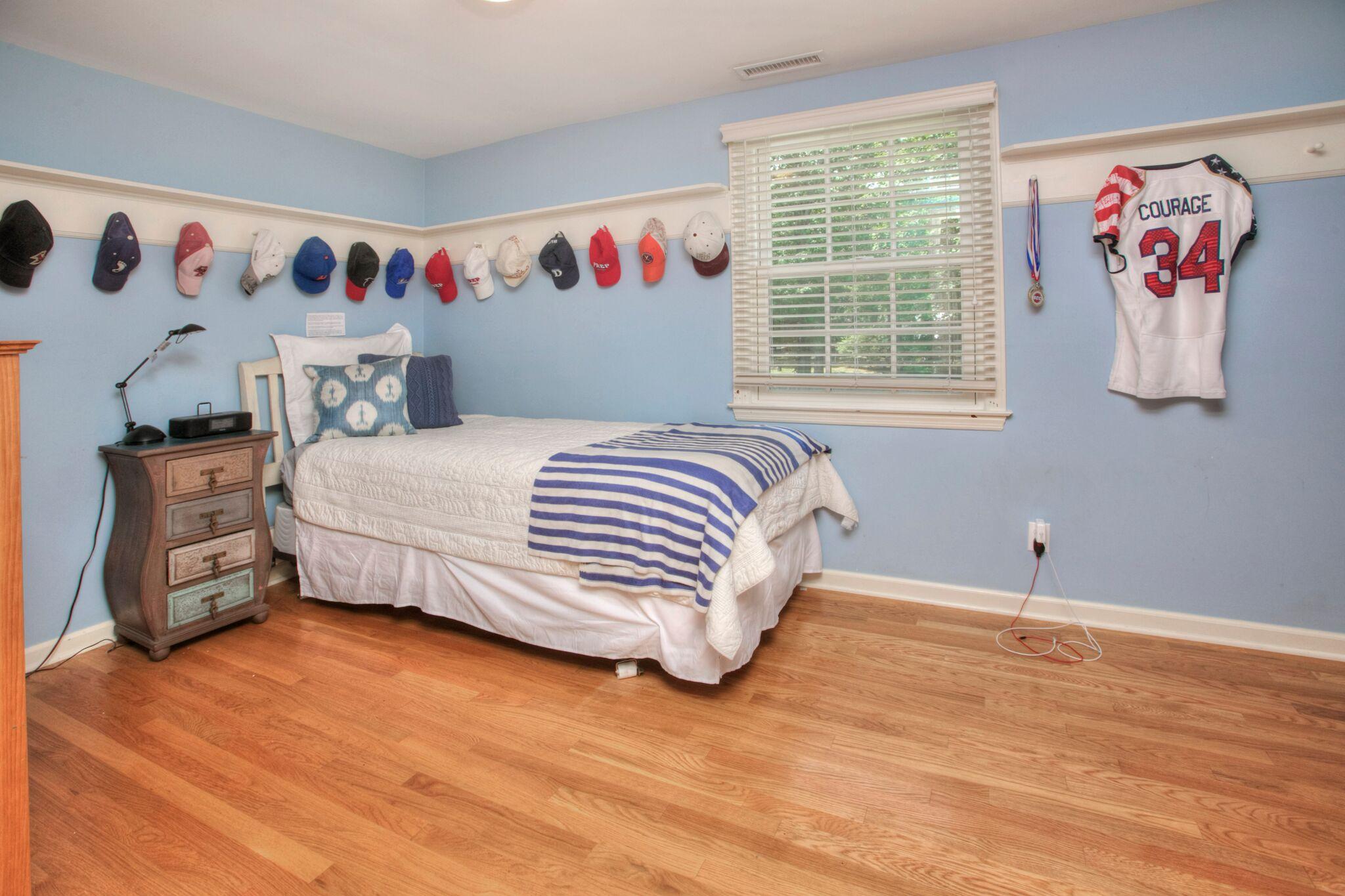 5 Haskell Lane Darien, CT 06820 - Photo 16 of 22 a bedroom with a bed and a window